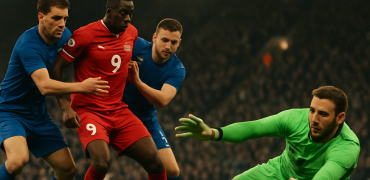 A goalkeeper saves a shot as defenders pressure the attacker, illustrating how team defence